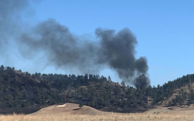 Earthmoving equipment mechanical failure touched off fire north of Rapid City