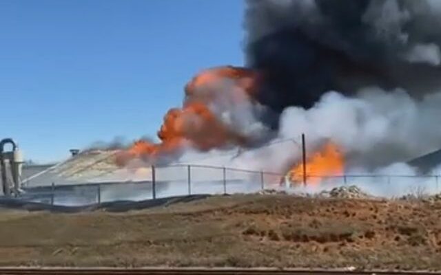 Firefighters battle large structure fire near Rapid City