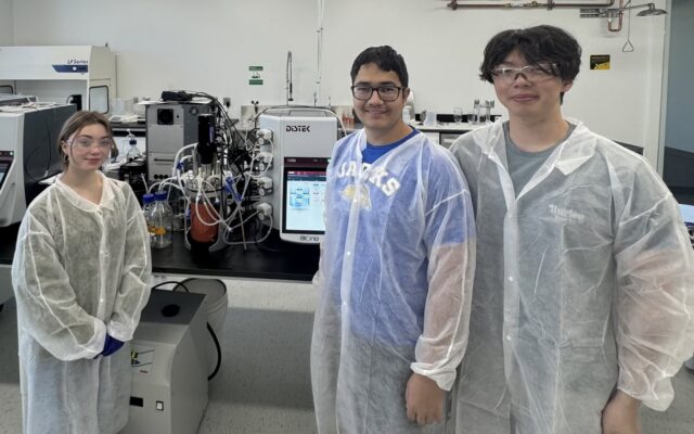 BHS graduates Madyson Oines, Waylon Lowe, and Quinton Zhu (pictured left to right) gain hands-on experience at Dakota BioWorx through a 10-week prototype bioprocess training program designed to help grow South Dakota’s biomanufacturing workforce. (Courtesy photo from the Brookings School District).